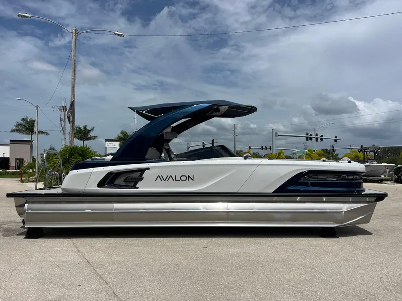 Slide: The Image of 2025 Avalon 2785 Excalibur Carbon Series pontoon boat with Mercury 400 V-10 Verado engine. - 41
