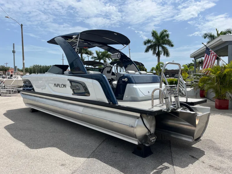 Slide: The Image of 2025 Avalon 2785 Excalibur Carbon Series pontoon boat with Mercury 400 V-10 Verado engine. - 44