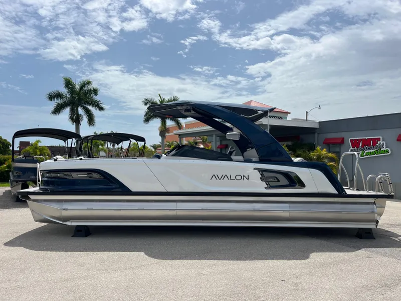 Slide: The Image of 2025 Avalon 2785 Excalibur Carbon Series pontoon boat with Mercury 400 V-10 Verado engine. - 45