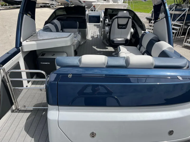 Slide: The Image of 2025 Avalon 2785 Excalibur Carbon Series boat interior with luxury seating and modern design. - 46
