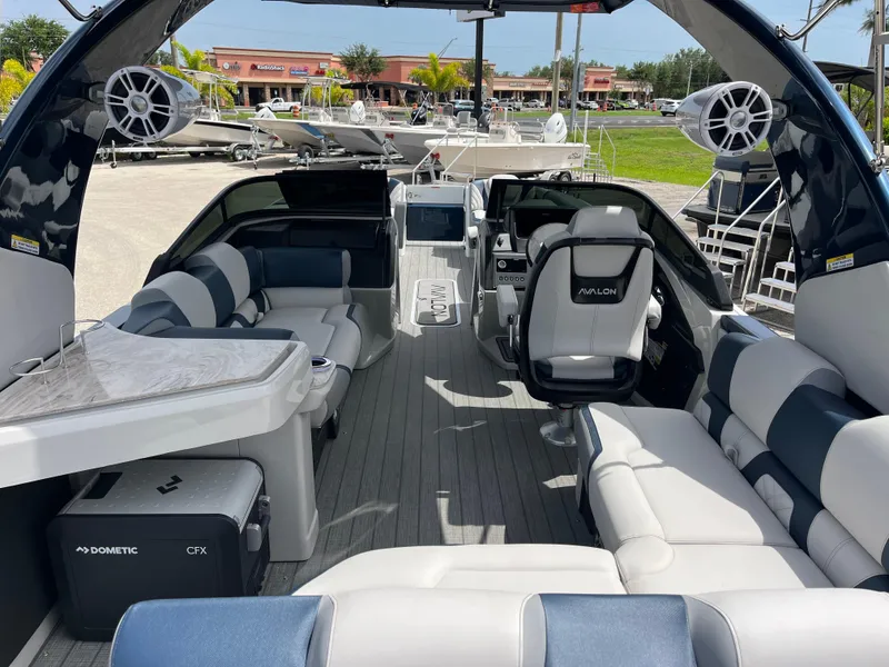 Slide: The Image of Luxurious 2025 Avalon 2785 Excalibur boat interior with plush seating and modern amenities. - 48