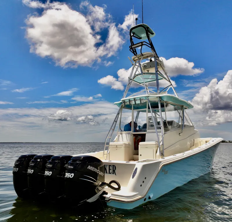 Slide: The Image of 2016 SeaVee 430 Fish Around boat with triple Mercury engines on calm water. - 20