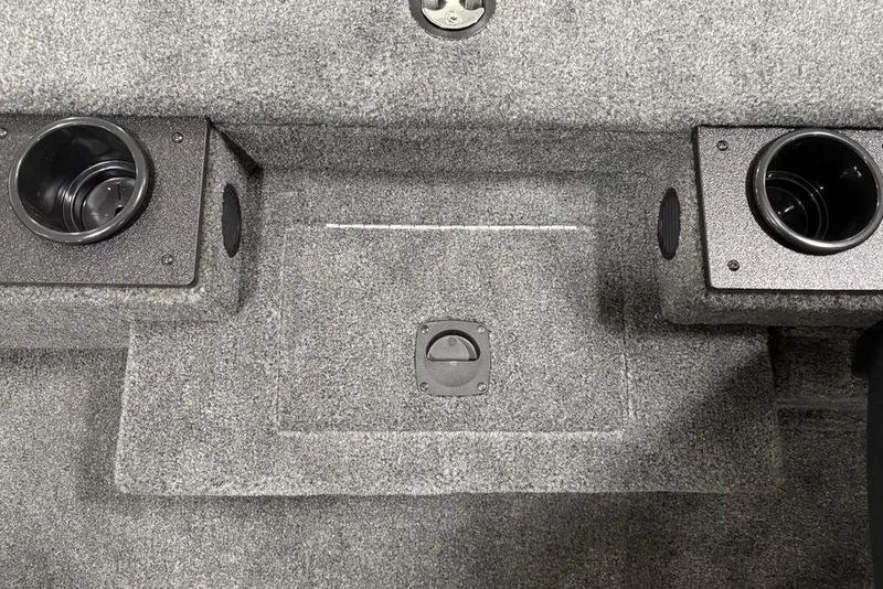 Slide: The Image of Interior of 2025 Tracker Pro Team™ 190 boat with cup holders and carpeted flooring. - 12