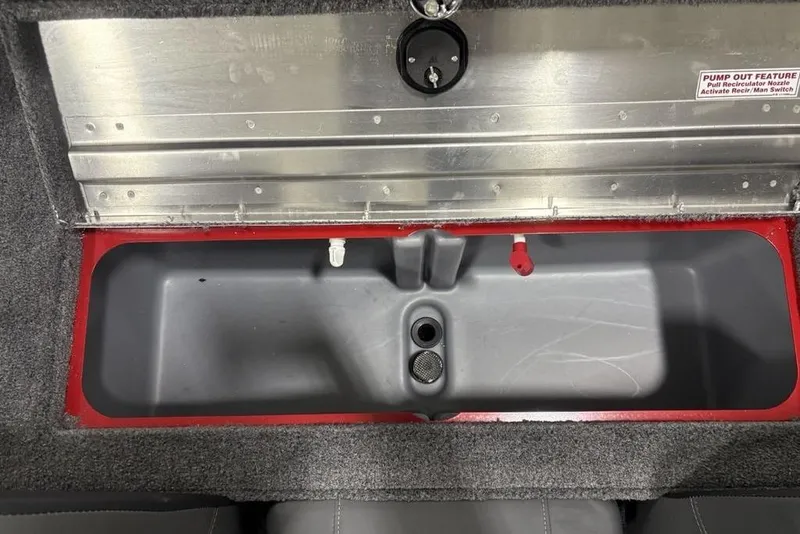 Slide: The Image of Livewell compartment in 2025 Tracker Pro Team™ 190 boat, featuring pump-out feature. - 26