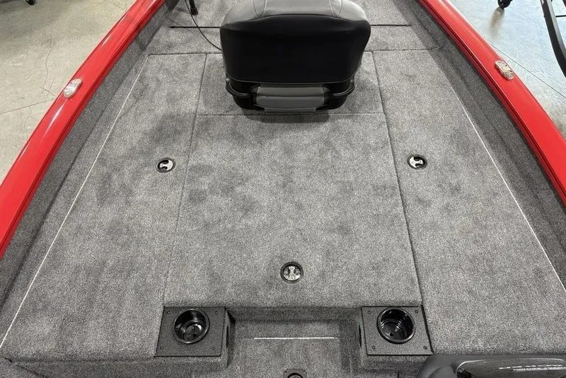 Slide: The Image of 2025 Tracker Pro Team™ 190 boat interior with gray carpet and black seat. - 9