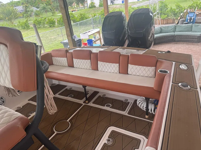 Slide: The Image of Control panel of a 2008 Avanti 36 boat with navigation screens and gauges. - 10