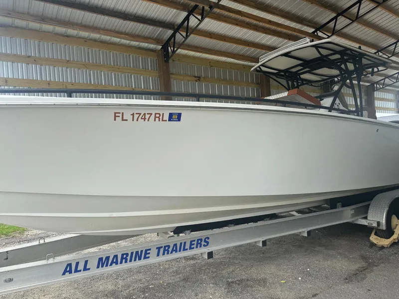 Slide: The Image of 2008 Avanti 36 boat on trailer under shelter, side view. - 2