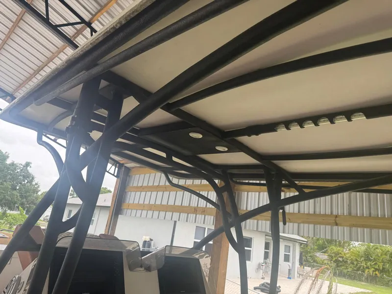 Slide: The Image of 2008 Avanti 36 boat interior with tan seating and black railings. - 20