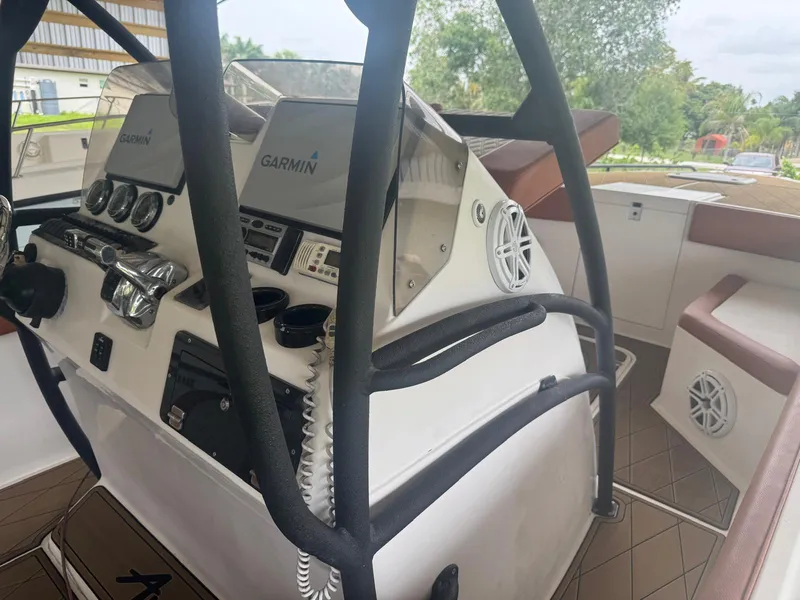 Slide: The Image of 2008 Avanti 36 boat interior with cushioned seating and built-in speakers. - 23