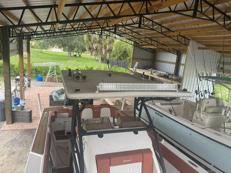 Slide: The Image of 2008 Avanti 36 boat underside view with trailer in outdoor setting. - 24