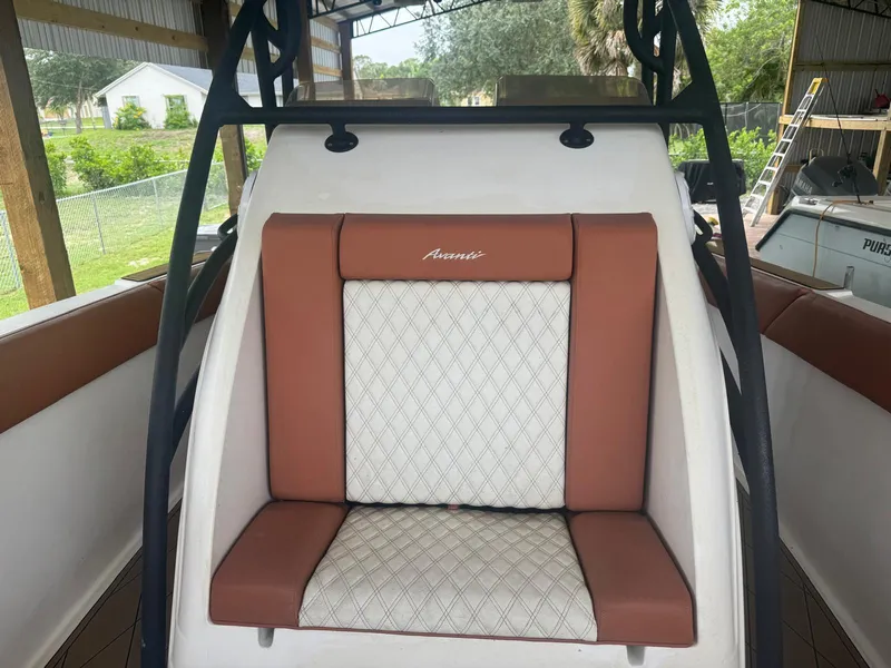 Slide: The Image of 2008 Avanti 36 boat on trailer under covered area. - 25