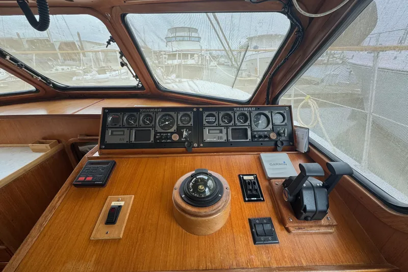 Slide: The Image of Control panel of a 1986 Kha Shing 37' yacht with navigation instruments. - 53