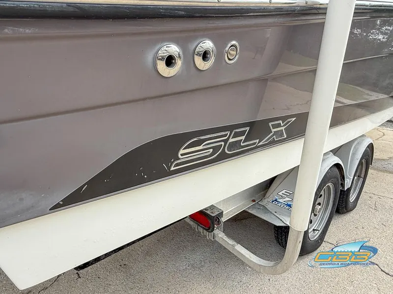 Slide: The Image of 2008 Sea Ray 270 SLX boat on trailer, side view with SLX logo. - 16