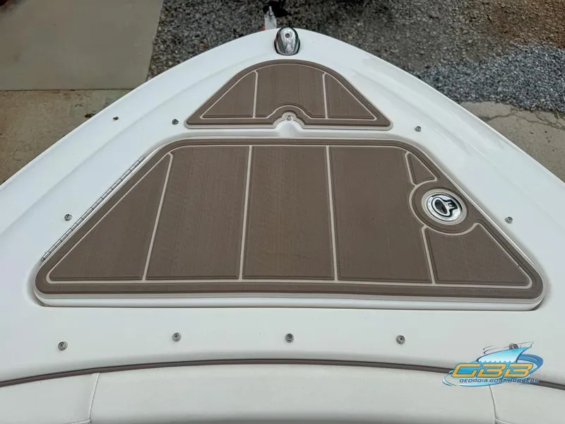 Slide: The Image of Bow of 2008 Sea Ray 270 SLX boat with tan deck padding. - 20