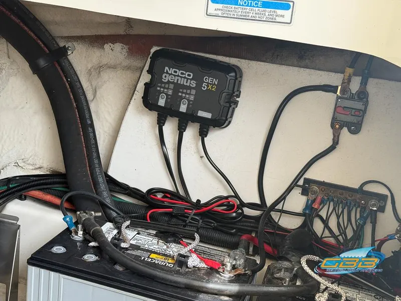 Slide: The Image of Battery compartment of a 2008 Sea Ray 270 SLX with NOCO Genius GEN5X2 charger. - 29