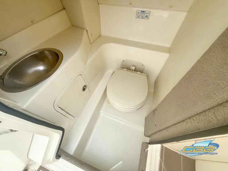 Slide: The Image of 2008 Sea Ray 270 SLX boat bathroom with sink and toilet. - 36