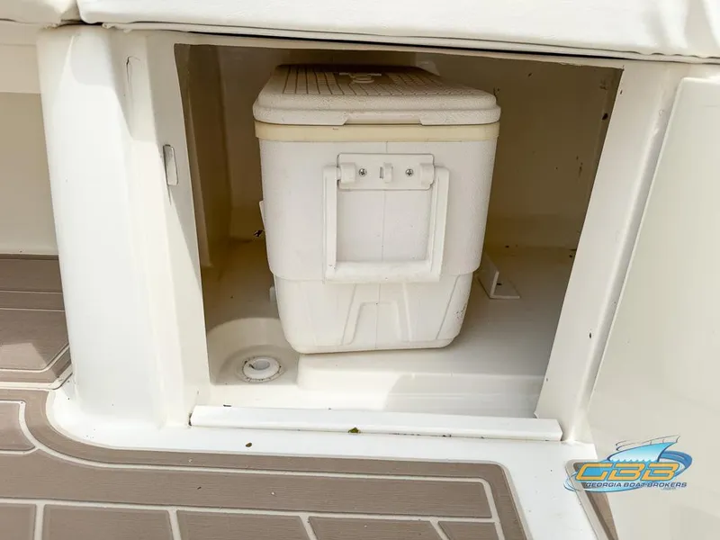 Slide: The Image of Storage compartment with cooler on a 2008 Sea Ray 270 SLX boat. - 40
