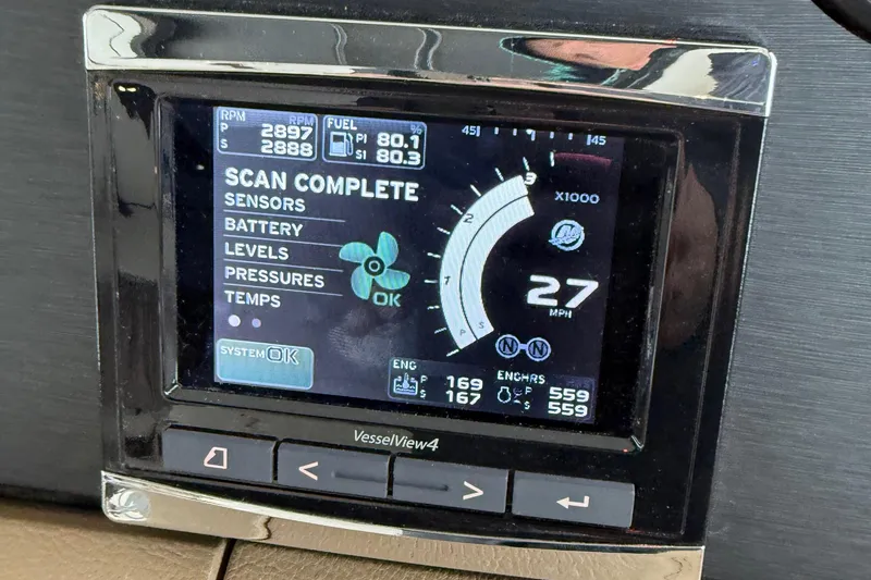Slide: The Image of Dashboard display of a 2016 Sea Ray 400 Sundancer showing engine and sensor data. - 19