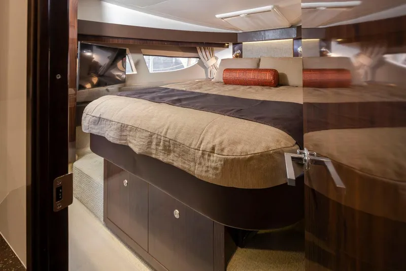 Slide: The Image of Luxurious cabin interior of 2016 Sea Ray 400 Sundancer yacht with cozy bedding. - 34