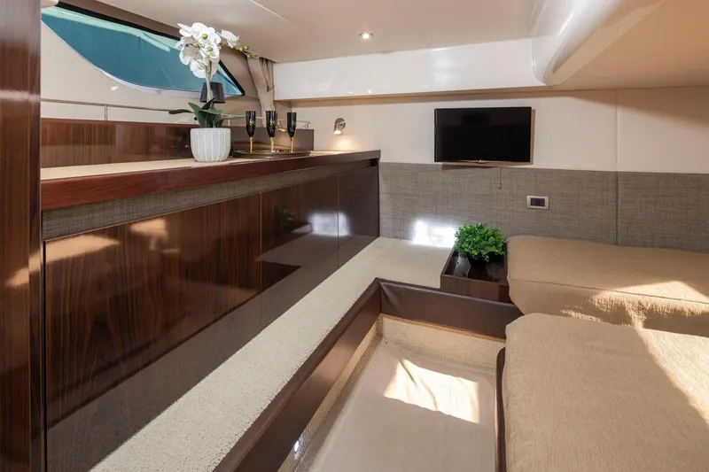 Slide: The Image of Luxurious interior of 2016 Sea Ray 400 Sundancer yacht with elegant decor and modern amenities. - 37