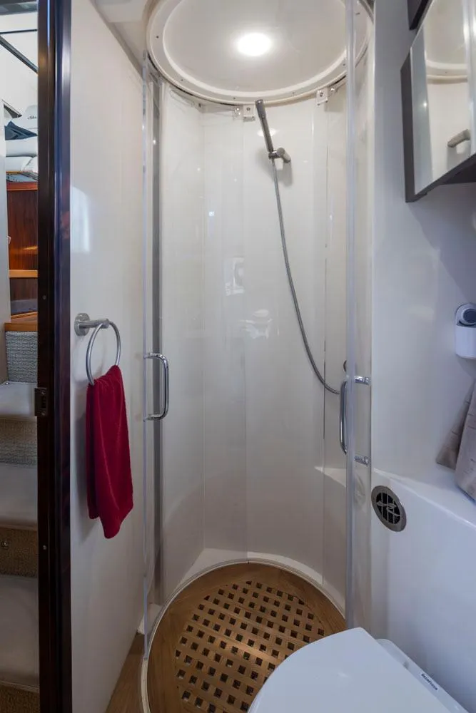Slide: The Image of Shower area in 2016 Sea Ray 400 Sundancer yacht, featuring modern design and amenities. - 41