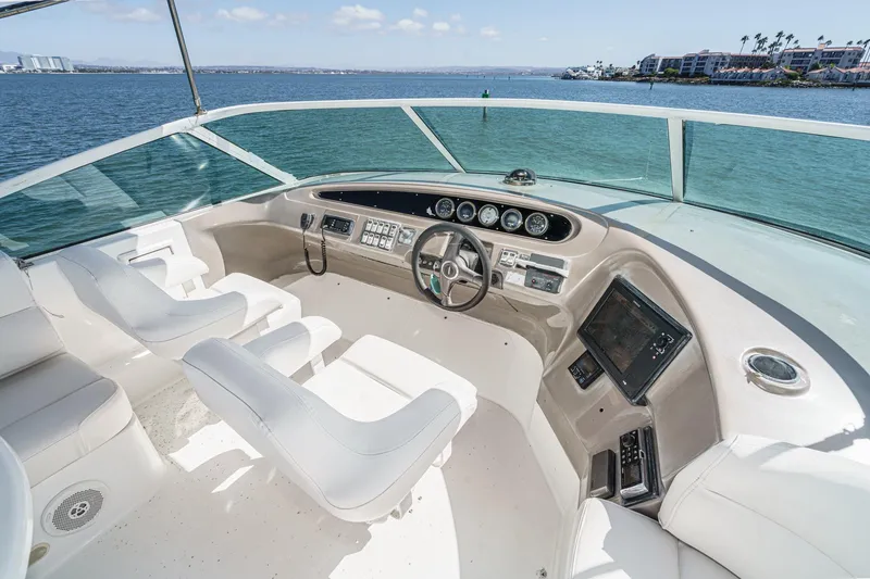 Slide: The Image of Pilothouse of 2000 Carver 450 Voyager yacht with modern controls and ocean view. - 30