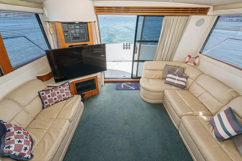 Slide: The Image of Luxurious interior of 2000 Carver 450 Voyager Pilothouse with leather seating and ocean view. - 37