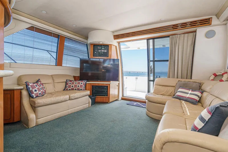 Slide: The Image of Luxurious interior of 2000 Carver 450 Voyager Pilothouse with leather seating and ocean view. - 38
