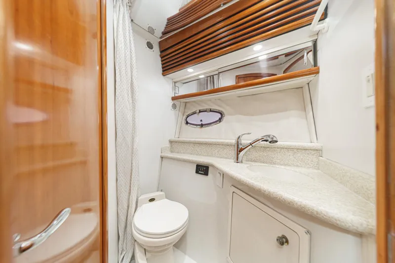 Slide: The Image of Luxurious bathroom in 2000 Carver 450 Voyager Pilothouse yacht with modern fixtures. - 59