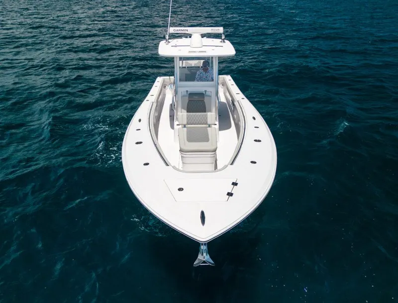 Slide: The Image of 2026 Front Runner 33 Center Console boat on open water, aerial view. - 5