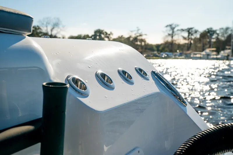 Slide: The Image of 2026 Front Runner 36 Center Console boat on water, close-up view. - 24