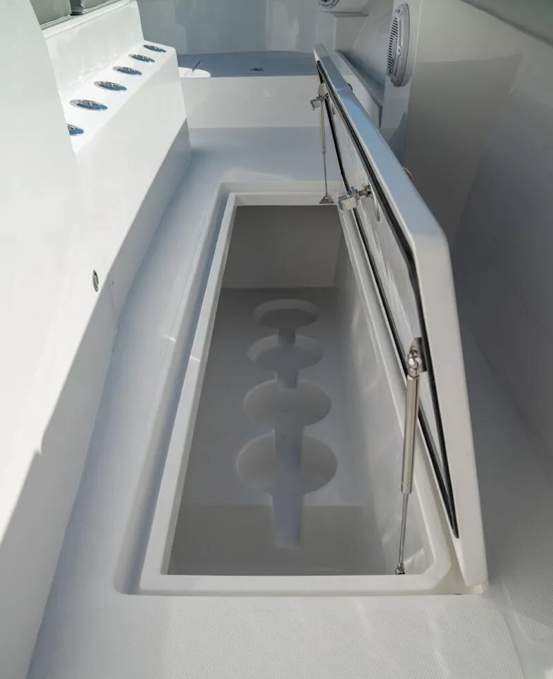 Slide: The Image of 2026 Front Runner 37 Catamaran with open storage compartment on deck. - 10