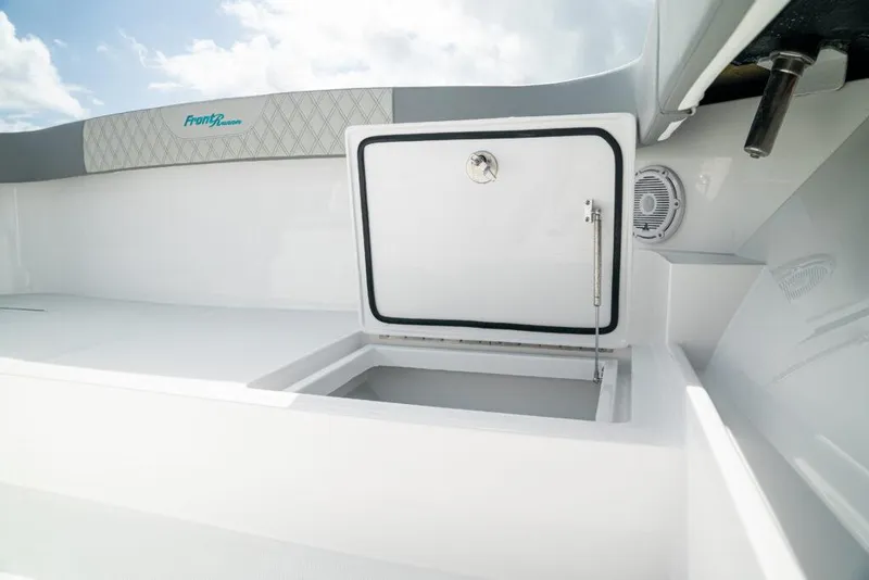 Slide: The Image of 2026 Front Runner 37 Catamaran storage compartment with open hatch, showcasing sleek design. - 17