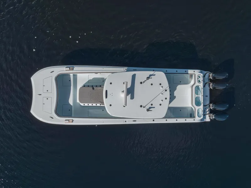 Slide: The Image of Aerial view of 2026 Front Runner 37 Catamaran on calm water. - 2