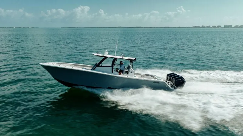 The Image of 2026 Front Runner 39 Center Console boat cruising on open water. - 1