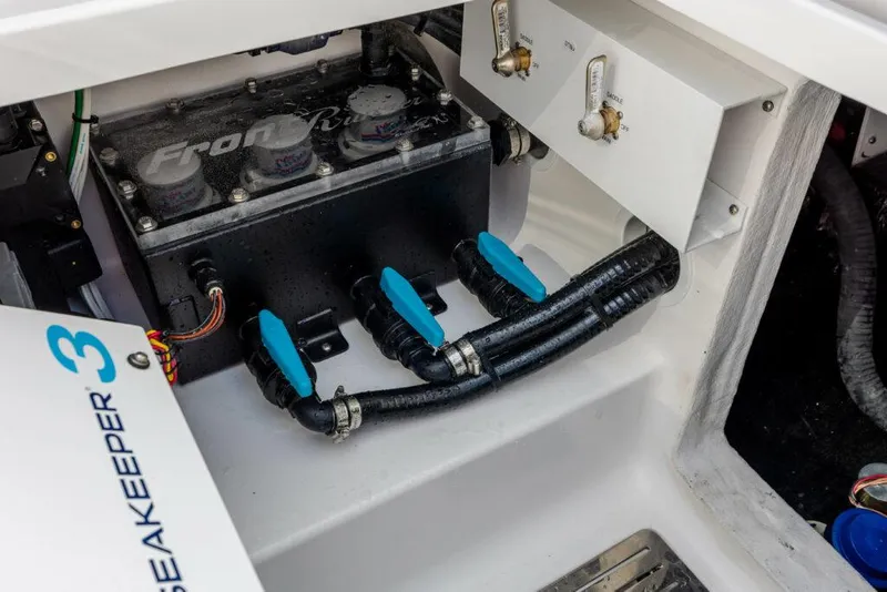 Slide: The Image of Engine compartment of 2026 Front Runner 39 Center Console with Seakeeper 3 system. - 19