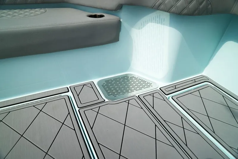 Slide: The Image of 2026 Front Runner 39 Center Console interior with sleek seating and modern flooring design. - 21