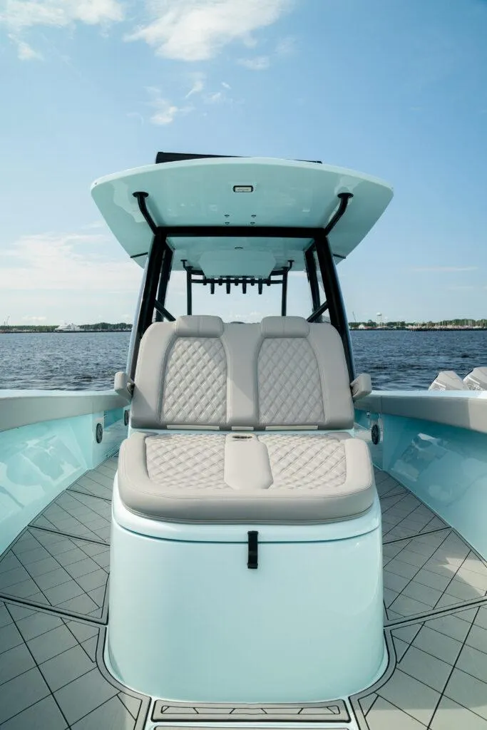 Slide: The Image of 2026 Front Runner 39 Center Console boat with luxurious seating on a sunny day. - 22