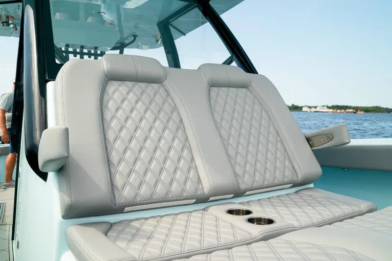 Slide: The Image of Luxurious seating on 2026 Front Runner 39 Center Console boat with quilted upholstery. - 25