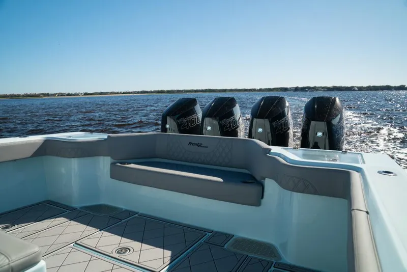 Slide: The Image of 2026 Front Runner 39 Center Console boat with four powerful engines on open water. - 28