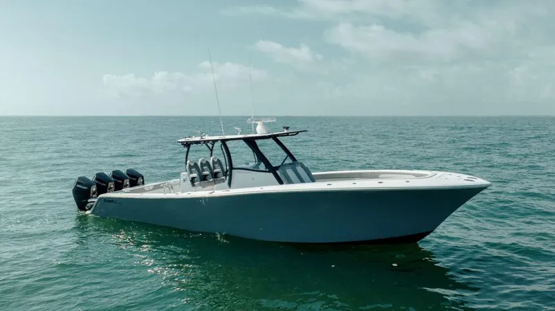 Slide: The Image of 2026 Front Runner 39 Center Console boat on open water under clear sky. - 3