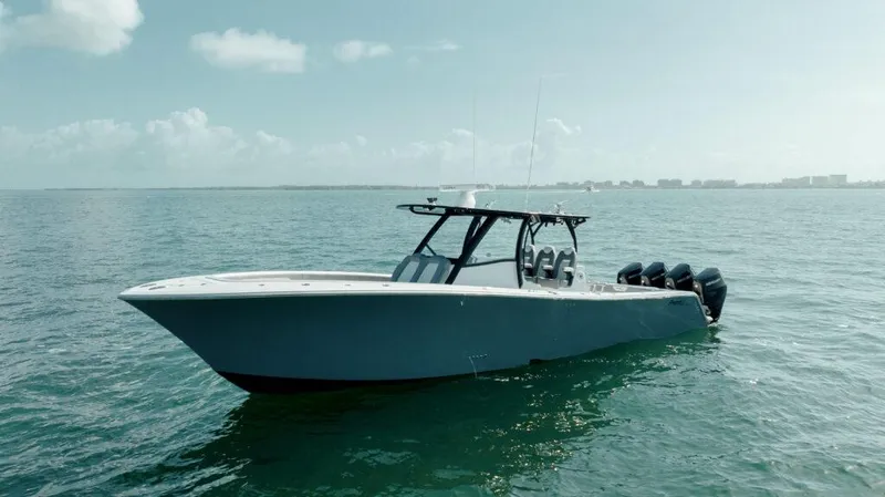 Slide: The Image of 2026 Front Runner 39 Center Console boat on calm ocean waters. - 7