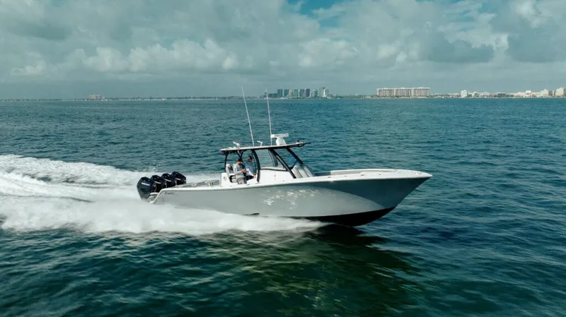 Slide: The Image of 2026 Front Runner 39 Center Console boat cruising on open water. - 9