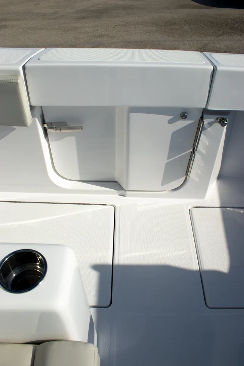 Slide: The Image of 2026 Front Runner 43 Catamaran deck with storage compartment and cup holder. - 15