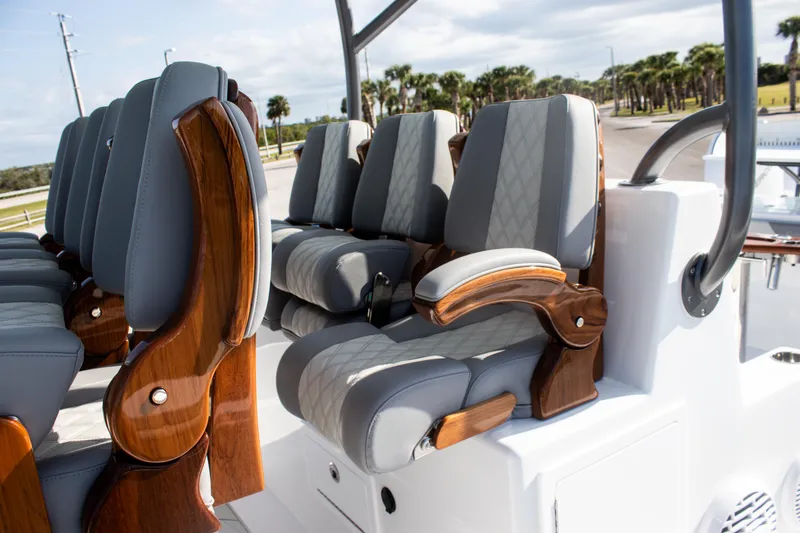 Slide: The Image of Luxurious seating on 2026 Front Runner 43 Catamaran with elegant wood accents. - 16