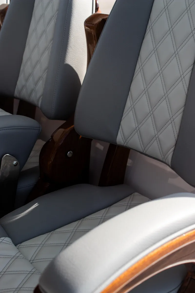 Slide: The Image of Luxury seating on 2026 Front Runner 43 Catamaran with diamond-stitched upholstery. - 19