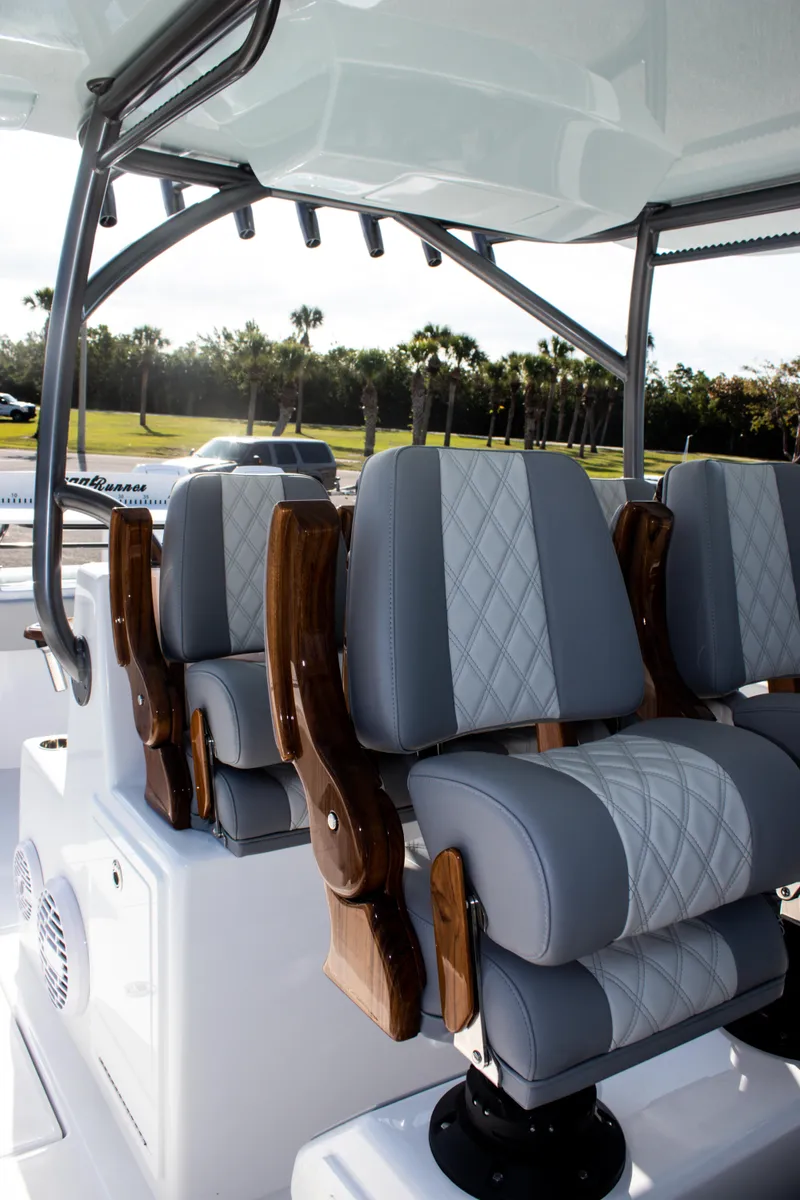 Slide: The Image of Luxury seating on 2026 Front Runner 43 Catamaran with elegant design and wood accents. - 26