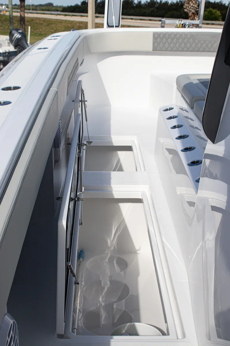 Slide: The Image of 2026 Front Runner 43 Catamaran interior with storage compartments and seating. - 36