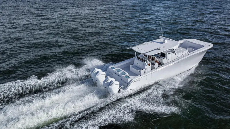 Slide: The Image of 2026 Front Runner 43 Catamaran cruising on open water, showcasing sleek design and powerful engines. - 7