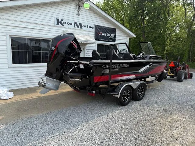Slide: The Image of 2025 Crestliner 2050 Fish Hawk boat on trailer at Knox Marine dealership. - 3